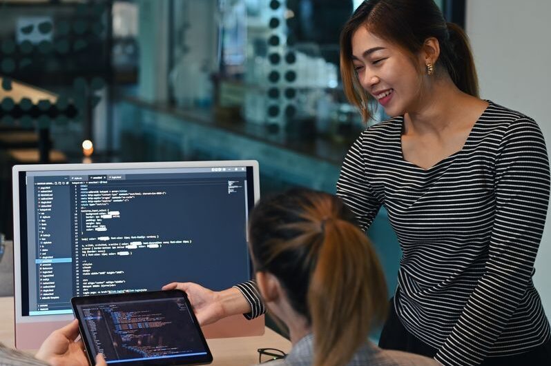 Female project supervisor explaining detail of pro